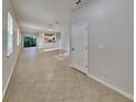 Bright and airy living space with neutral paint and tile flooring at 2837 Santego Bay Ct, Brandon, FL 33511