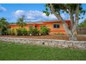 Cozy single-story home with mature trees and beautiful landscaping at 413 Blackburn Rd, Nokomis, FL 34275