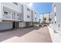 Brick driveway providing ample parking to the elevated beachfront house at 12274 1St W St # 2, Treasure Island, FL 33706