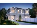 Charming two-story home featuring a well-maintained lawn, modern design, and a cozy, inviting front entrance at 807 E Ida St # 1, Tampa, FL 33603