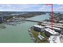 This aerial view shows close proximity to the beach and intercoastal waterway, offering boat access at 9815 Harrell Ave # 502, Treasure Island, FL 33706
