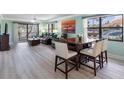 Inviting living room boasting stylish furniture, neutral tones, and great natural light at 3210 Gulf Blvd # 108, Belleair Beach, FL 33786