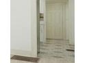 Bright hallway featuring clean lines and modern flooring at 8008 N Alaska St, Tampa, FL 33604