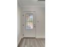 Elegant front door with decorative glass at 1968 Rolling Green Cir, Sarasota, FL 34240