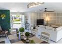 Open-concept living room showcases modern design, natural light, and a unique decor at 600 Eleuthera Dr, Punta Gorda, FL 33950