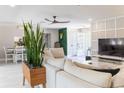 Inviting living area with comfortable seating, stylish accents, and indoor greenery at 600 Eleuthera Dr, Punta Gorda, FL 33950