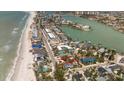 Aerial view outlining property lines near a sandy beach, conveniently located near the bay and main street at 8403 W Gulf Blvd, Treasure Island, FL 33706