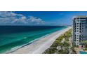 Breathtaking view of white sand beach and emerald gulf waters at 1660 Gulf Blvd # Ph-7, Clearwater Beach, FL 33767