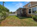 A beautiful fenced backyard, spacious screened in lanai, and well maintained lawn create a perfect oasis at 11656 Lake Blvd, New Port Richey, FL 34655