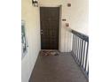 Inviting exterior door with a decorative mat providing a warm welcome to the unit at 2971 Estancia Blvd # 225, Clearwater, FL 33761
