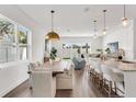 Spacious floorplan shows a view from the dining area and kitchen into the main living area at 5530 N 9Th St # 1, Tampa, FL 33604