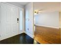 Inviting foyer with views of the living area, showcasing hardwood floors and ample natural light at 810 Island Walk Dr # 810, Tampa, FL 33602