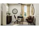 Inviting home office with a modern desk and a large window at 17611 Happytrails St, Land O Lakes, FL 34638