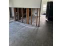 Kitchen under construction with exposed wall studs, providing an opportunity for a custom design and layout at 5312 Berkley Rd, New Port Richey, FL 34652
