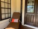 Cozy porch area perfect for relaxing and enjoying the outdoors at 776 Lakewood Dr, Palm Harbor, FL 34684