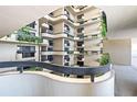 Beautiful condominium interior with curving balconies and lush plantings at 2413 Bayshore Blvd # 801, Tampa, FL 33629