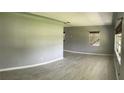 Spacious living room with hardwood flooring and abundant natural light at 4301 15Th N Ave, St Petersburg, FL 33713
