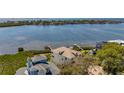 Picturesque aerial view of the waterfront home with lush greenery and stunning ocean views at 404 Hillsborough St, Palm Harbor, FL 34683