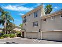 Charming multi-story townhome with attached garages and a well-manicured landscape at 501 Knights Run Ave # 5101, Tampa, FL 33602