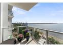 Balcony view of the city and waterfront, decorated with potted plants at 2910 W Barcelona St # 1902, Tampa, FL 33629