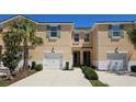Charming two-story home with a one car garage and inviting landscaping at 5509 Cumberland Star Ct, Lutz, FL 33558