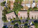 Aerial view of townhomes with parking, landscaping, and proximity to neighborhood amenities at 7826 66Th N Way, Pinellas Park, FL 33781