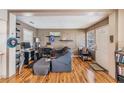 Spacious living room with wood floors and neutral tones perfect for relaxing or entertaining at 1025 W Berry Ave, Tampa, FL 33603