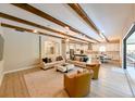 Spacious living room with wood beams, recessed lighting, and an open concept design at 21794 Pristine Lake Blvd, Land O Lakes, FL 34637