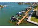 Private boat dock with lifts provides direct access to the open water and waterfront living at 5353 Gulf Blvd # B103, St Pete Beach, FL 33706
