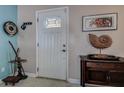 Inviting front door with glass insert and interior decor at 5931 33 N Ave, St Petersburg, FL 33710