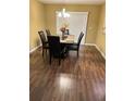 Elegant dining room with hardwood floors at 9508 Ashburn Creek Ln, Tampa, FL 33610