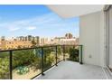 Balcony view featuring an outdoor playground and city skyline against a bright blue sky at 111 N 12Th St # 1502, Tampa, FL 33602