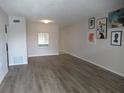 Spacious living room with hardwood floors and artwork on the wall at 2001 World Parkway Blvd # 49, Clearwater, FL 33763
