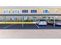 Covered parking at condo building, offering protection from the elements for residents' vehicles at 5247 81St N St # 4, St Petersburg, FL 33709