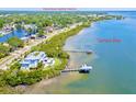 Breathtaking aerial view of waterfront home on Tampa Bay near Downtown Safety Harbor at 775 S Bayshore Blvd, Safety Harbor, FL 34695