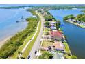 Waterfront property with road frontage on a sunny day with Tampa Bay views at 775 S Bayshore Blvd, Safety Harbor, FL 34695