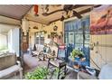 A charming outdoor patio featuring comfortable seating and decorative accents at 117 Myrtle Ln, Plant City, FL 33565