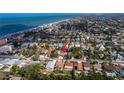 Beautiful aerial view of a neighborhood with easy access to both the bay and the beach at 122 10Th Ave, Indian Rocks Beach, FL 33785