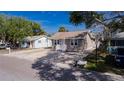 Charming single-story home with a well-maintained lawn in a peaceful neighborhood at 122 10Th Ave, Indian Rocks Beach, FL 33785