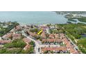 Aerial view of the waterfront condo complex with surrounding trees at 3675 41St S Way # K, St Petersburg, FL 33711