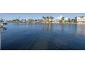 Expansive water view showcasing waterfront properties and the tranquil waterway at 533 Lillian Dr, Madeira Beach, FL 33708
