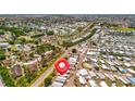 This aerial view showcases the community, its layout, proximity to amenities, and location in the surrounding area at 262 S Port Royal Ln, Apollo Beach, FL 33572