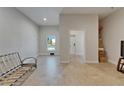Bright living room with tile floors, ample natural light, and neutral color scheme create a welcoming space at 718 S 22Nd St, Tampa, FL 33605