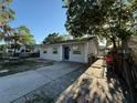 Cozy single-story house with a fenced yard providing privacy and security at 9618 N 13Th St, Tampa, FL 33612