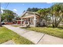 Lovely single-story home with a well-kept front yard and a welcoming facade at 2224 Gordon St, Tampa, FL 33605
