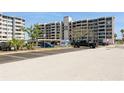 Ample parking spaces available in the exterior parking lot for residents and visitors at 450 Treasure Island Cswy # 505, Treasure Island, FL 33706