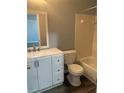 Clean bathroom with a white vanity, a framed mirror, and a combined shower and tub at 9501 Lake Park Dr # 9501, Thonotosassa, FL 33592
