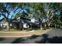 Charming home with a unique roof line surrounded by mature shade trees at 7033 123Rd St, Seminole, FL 33772