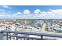 Expansive water views from this balcony, showcasing the coastal community with a mix of homes, shops and canals at 17408 Gulf Blvd # 1302, Redington Shores, FL 33708