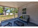 Cozy screened-in porch with comfortable seating, providing a relaxing outdoor space at 2639 28Th N Ave, St Petersburg, FL 33713